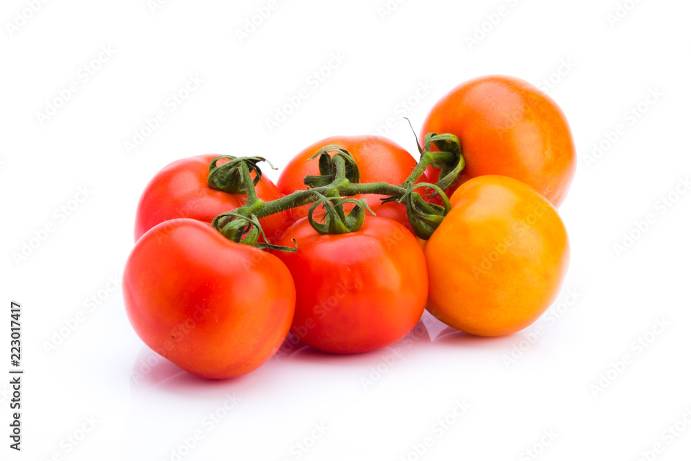 Cluster of fresh tomatoes on a white background, Ideal vegetable for a balanced diet Cluster of fresh tomatoes on a white background, Ideal vegetable for a balanced diet