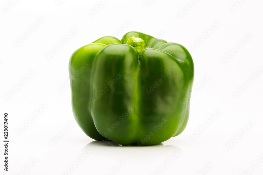 Front view of green pepper on a white background, vegetable to flavor Front view of green pepper on a white background, vegetable to flavor