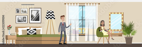 Bedroom interior in the house. Husband and wife in the room