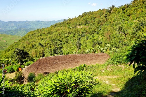 Wodden long house in Longwa tribal village, Mon, Nagaland, India, Myanmar photo