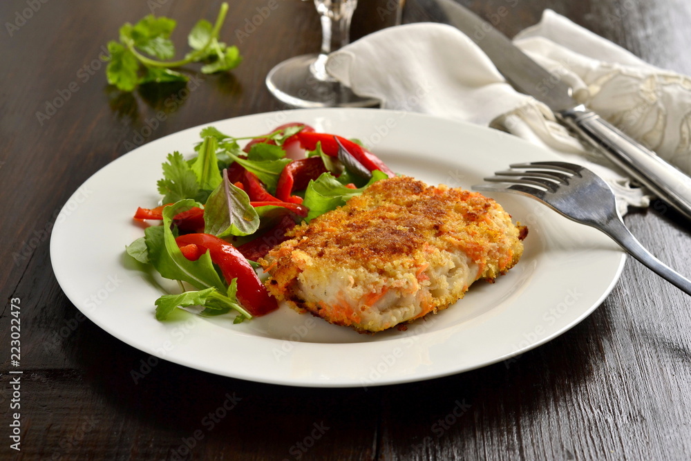 Fried white fish in breadcrumbs with vegetables Fried white fish in breadcrumbs with vegetables