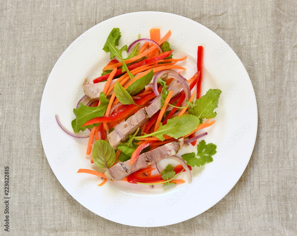 Salad with pork and vegetables, top view Salad with pork and vegetables, top view