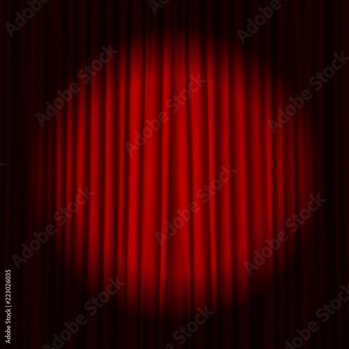 Closed red curtain background and spotlight. Theatrical drapes.