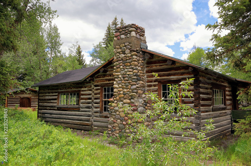 Abandoned log cabin in the wilderness