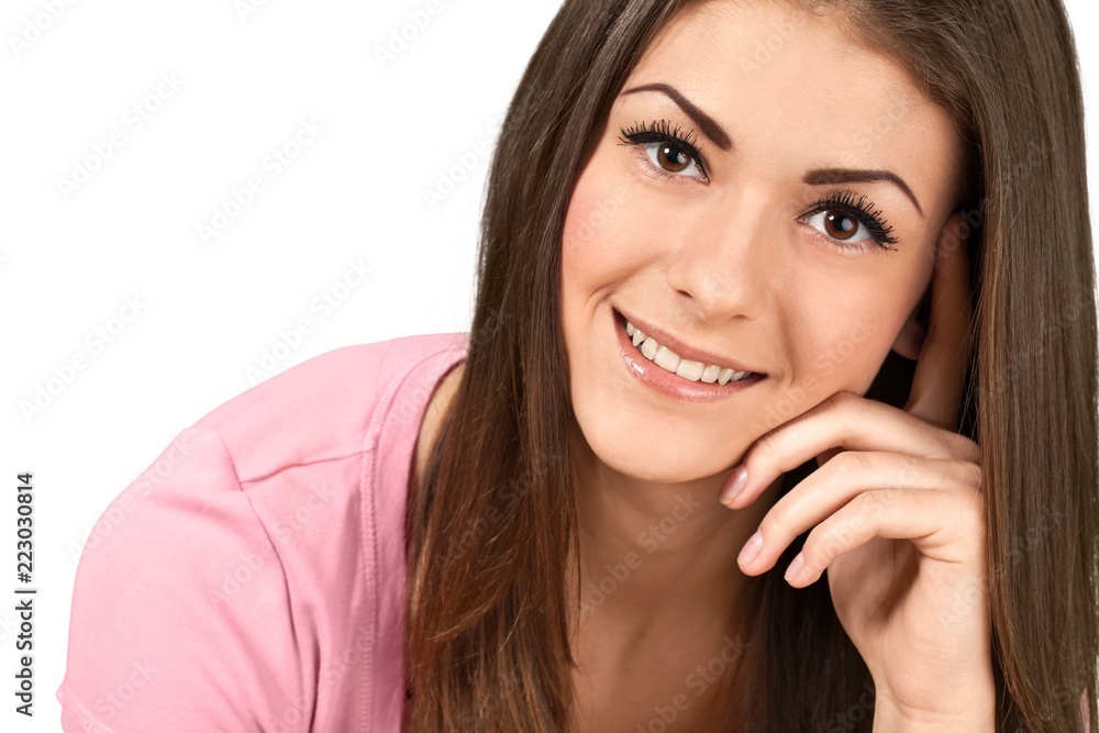 Friendly Young Woman with Head Resting on Hand - Isolated Friendly Young Woman with Head Resting on Hand - Isolated