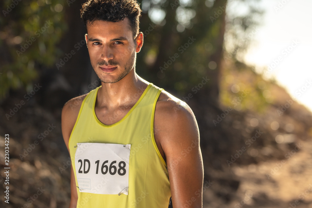 Man competing in mountain trail race