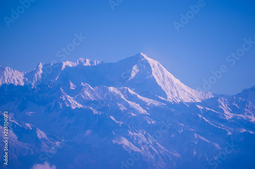 Himalaya mountains in Nepal, view of small village Braga on Annapurna circuit at sunset or sunrise © Solarisys