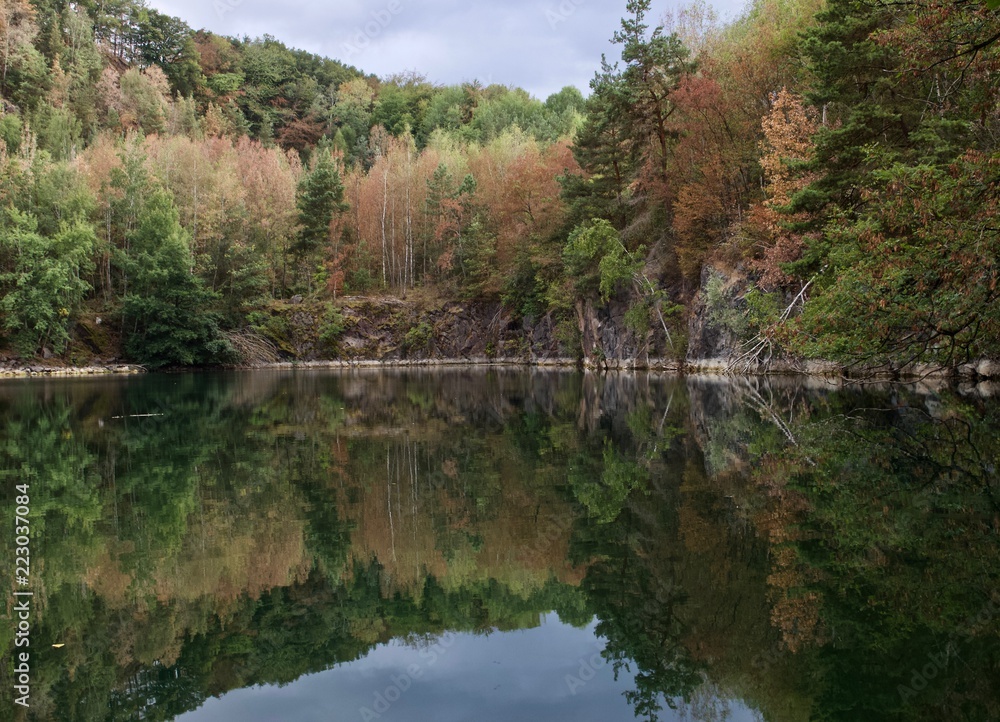Mirror Lake reflecting the forest and the sky, Germany Mirror Lake reflecting the forest and the sky, Germany