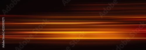Foto Abstract red light trails in the dark background