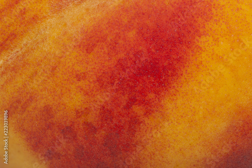 the skin of the peach as a background