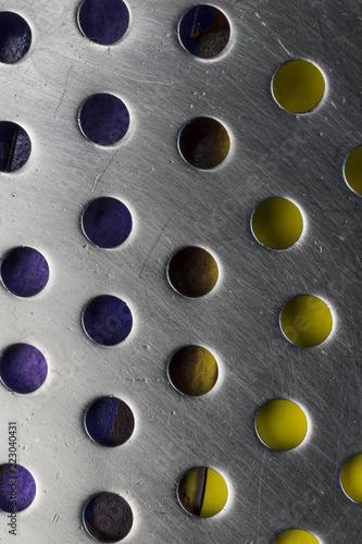 Perforated kitchen utensil.