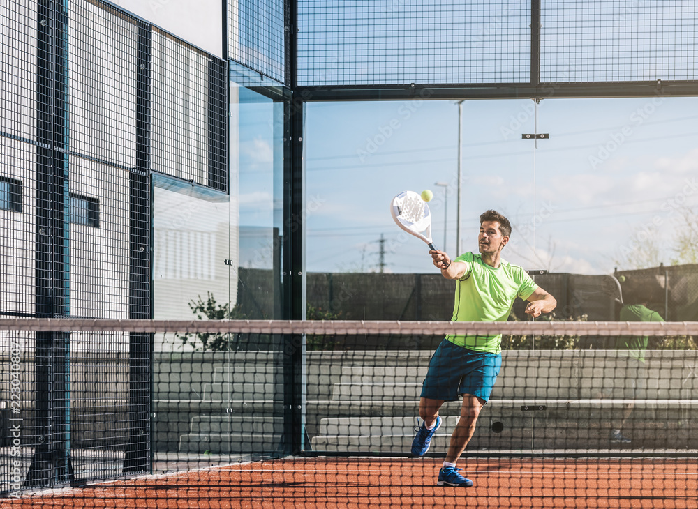 Man playing padel Man playing padel
