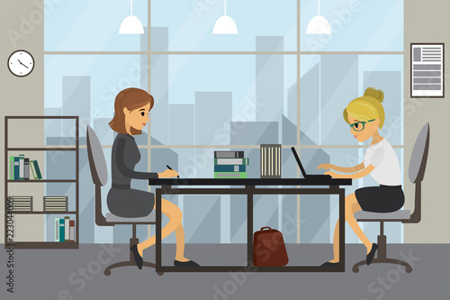 Two caucasian business women or office manager working in modern office.