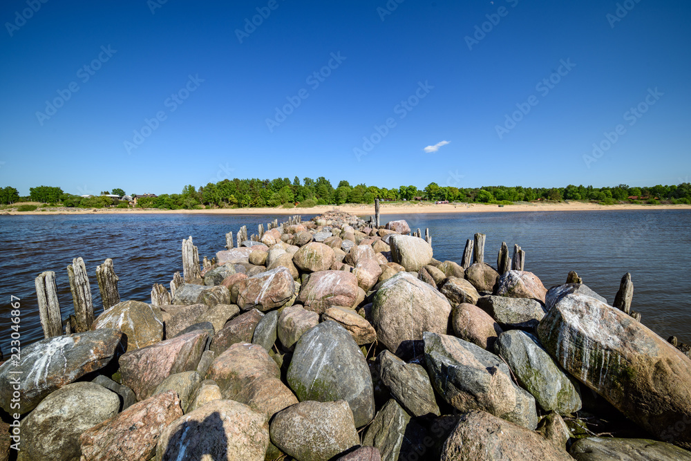 Fototapeta premium old stone brakewater in the Baltic sea