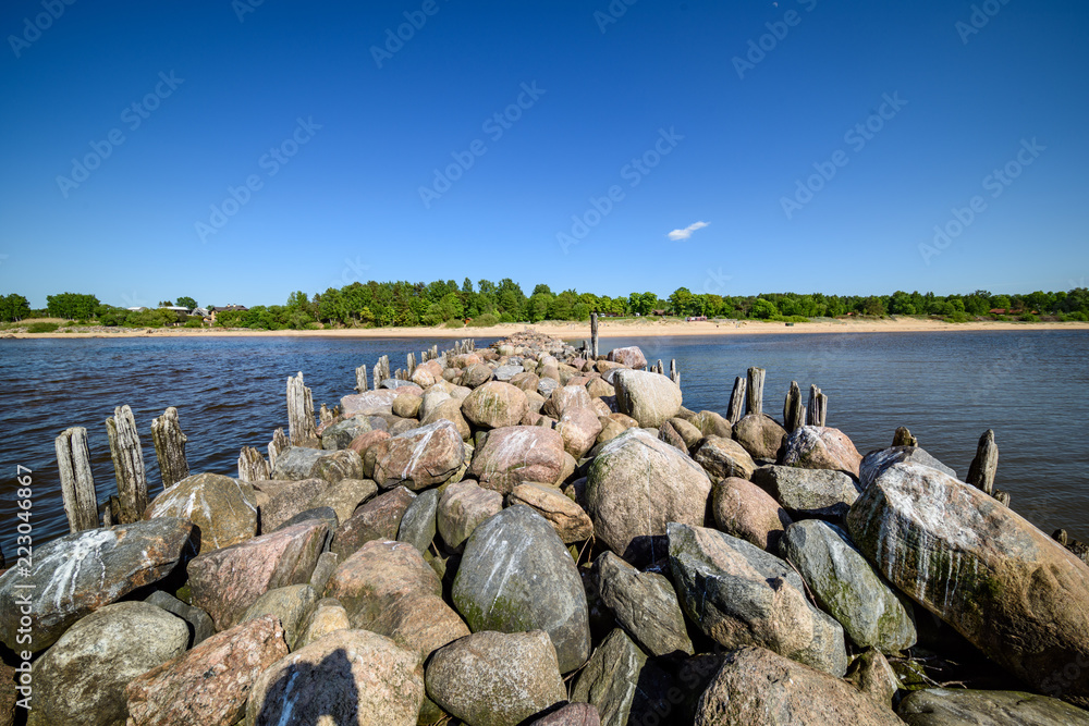 old stone brakewater in the Baltic sea