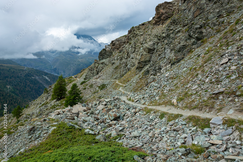 Hiking trail near the Matterhorn on a cloudy day