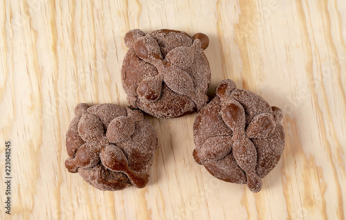 Pan de Muerto, Bread of Dead traditional Mexican sugar scone, baked on day of the dead festivities.