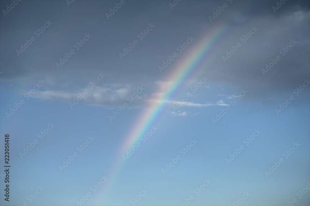 rainbow in the sky,nature,panorama,cloud,blue,weather,colors