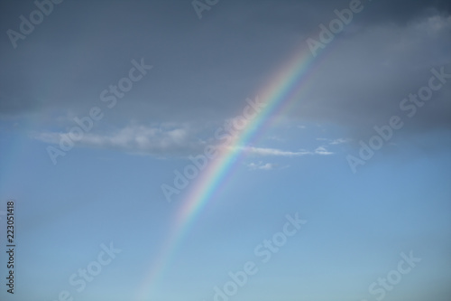 rainbow in the sky nature panorama cloud blue weather colors