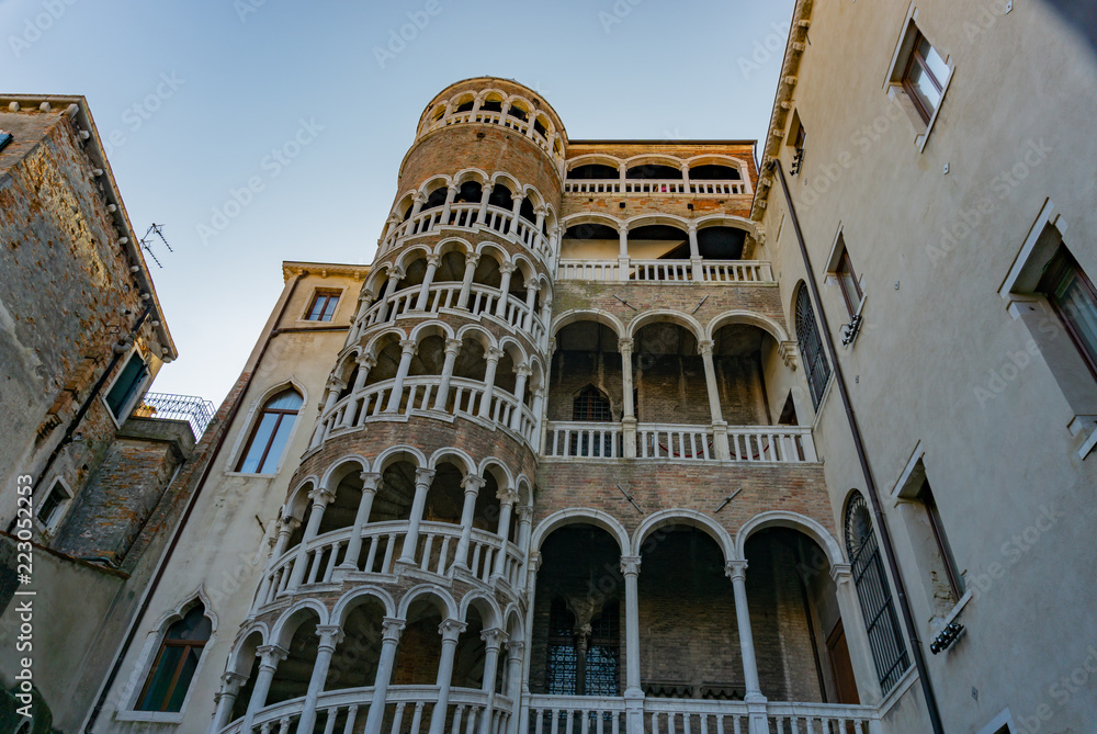 The Scala Contarini del Bovolo of Contarini Palace - beautiful ancient spiral stairway in Venice (UNESCO world heritage site), Veneto, Italy