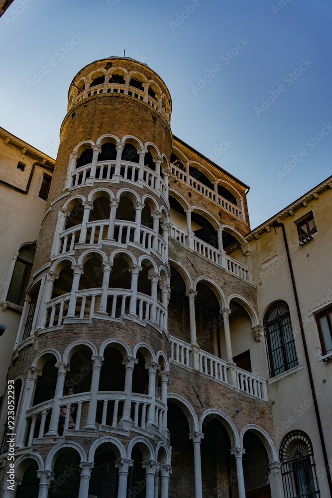 The Scala Contarini del Bovolo of Contarini Palace - beautiful ancient spiral stairway in Venice (UNESCO world heritage site), Veneto, Italy