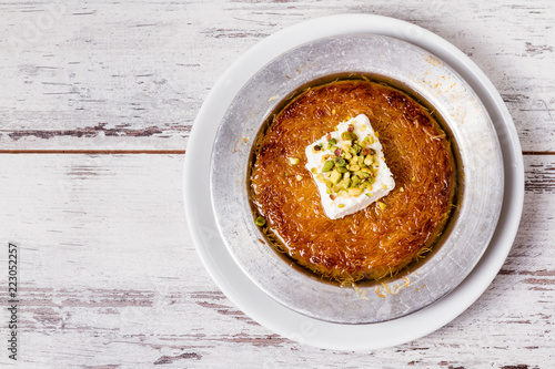 Delicious Traditional Turkish Dessert Kunefe with Pistachio and Cream
