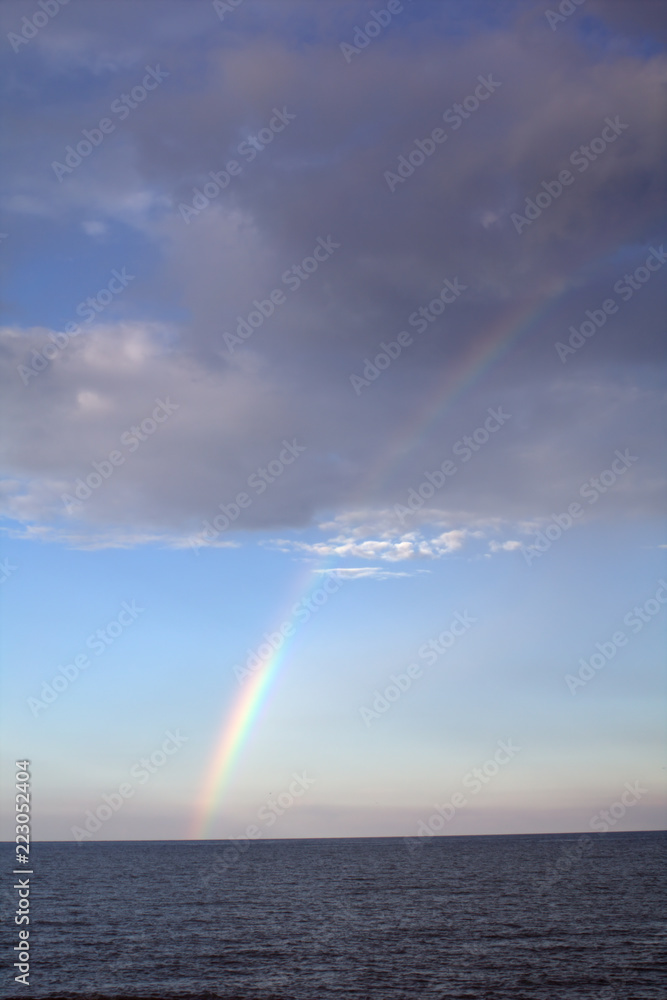 rainbow over the sea,horizon,nature,sky,weather,cloud,blue,light,color