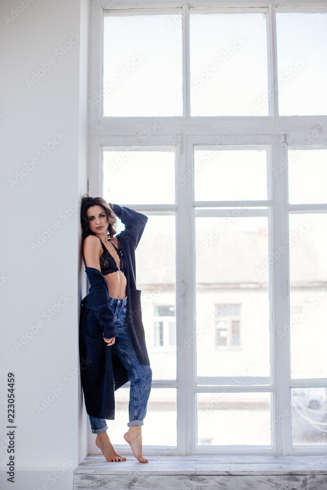 Beautiful girl by the window. Beautiful girl by the window.
