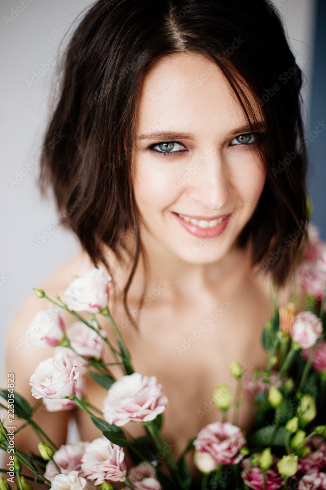 Beautiful girl with a bouquet flowers. Beautiful girl with a bouquet flowers.