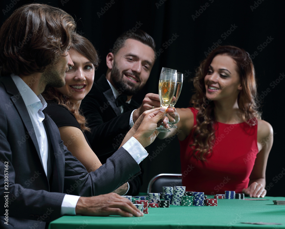 friends drinking and celebrating a gambling night