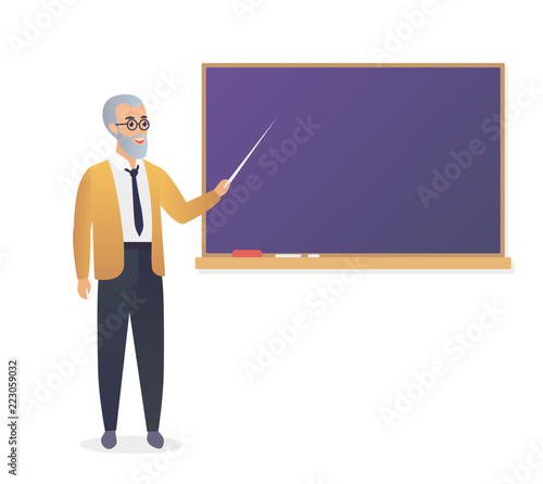 Senior teacher, old man professor standing in front of blackboard in classroom at school, college or university.