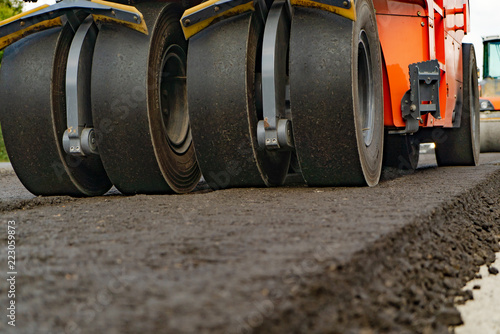large roller wheels are made for sealing and leveling the ground, road surfaces. Close-up