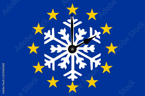 Europa Zeitumstellung Europaflagge mit Schneeflocke und Zeiger