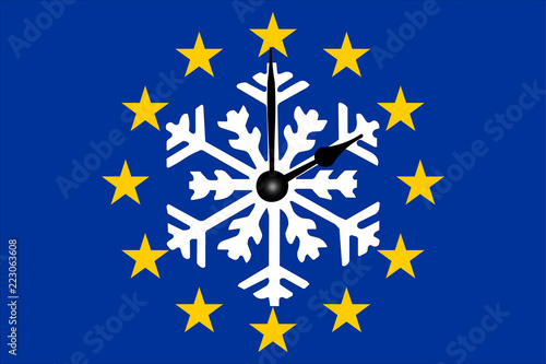 Europa Zeitumstellung Europaflagge mit Schneeflocke und Zeiger