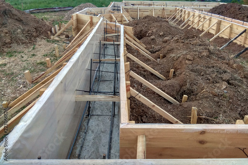 Photos Wooden formwork concrete strip foundation for a cottage