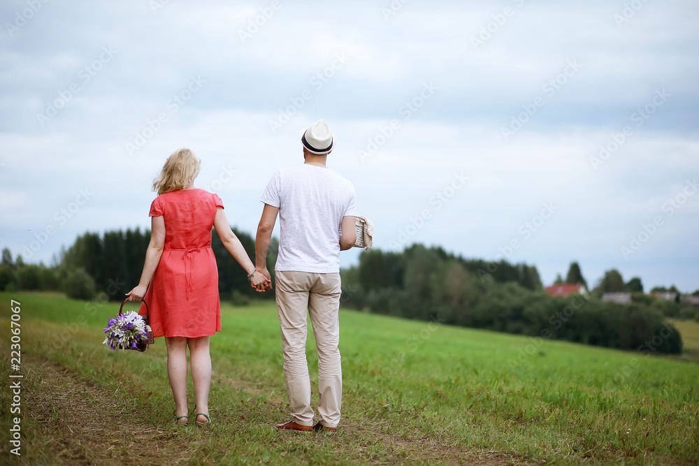 Pregnant girl with big belly and young man outdoor Pregnant girl with big belly and young man outdoor