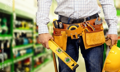 Worker with a tool belt © BillionPhotos.com