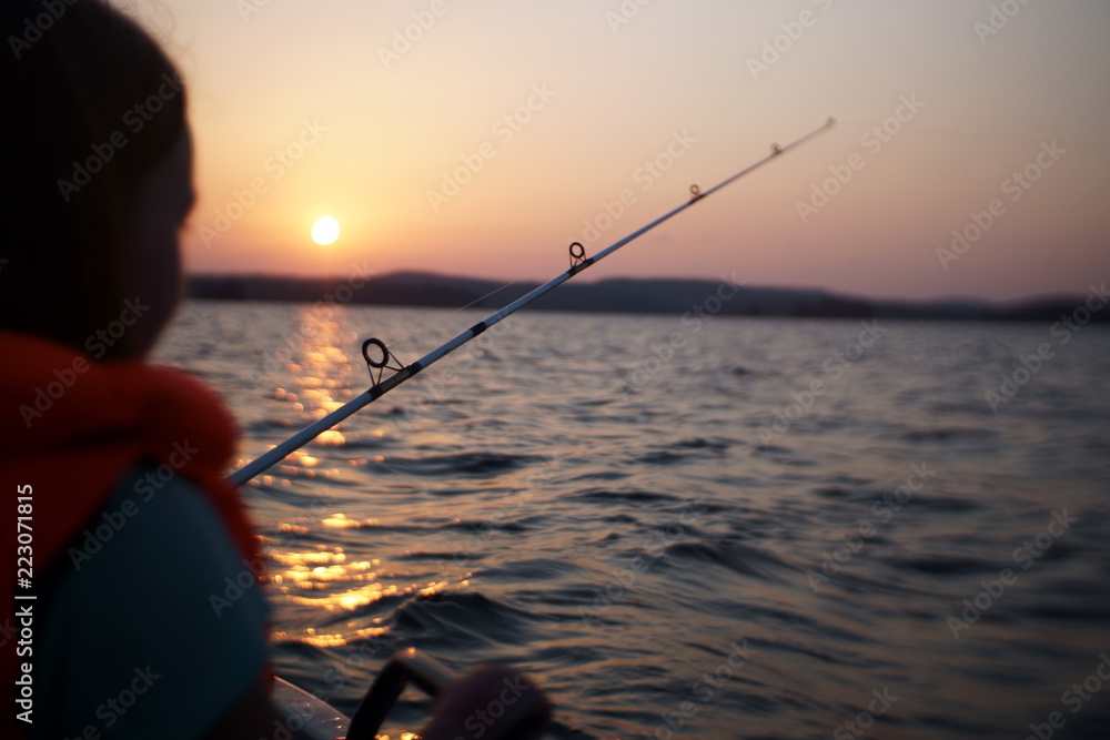 Fishing at sunset