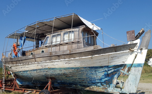 Old ruined fishing boat awaiting restoration