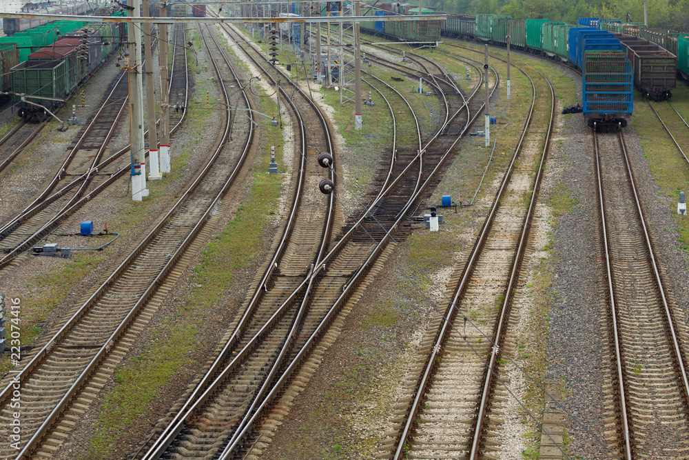 The railway junction on a cloudy day. Natural light. Landscape