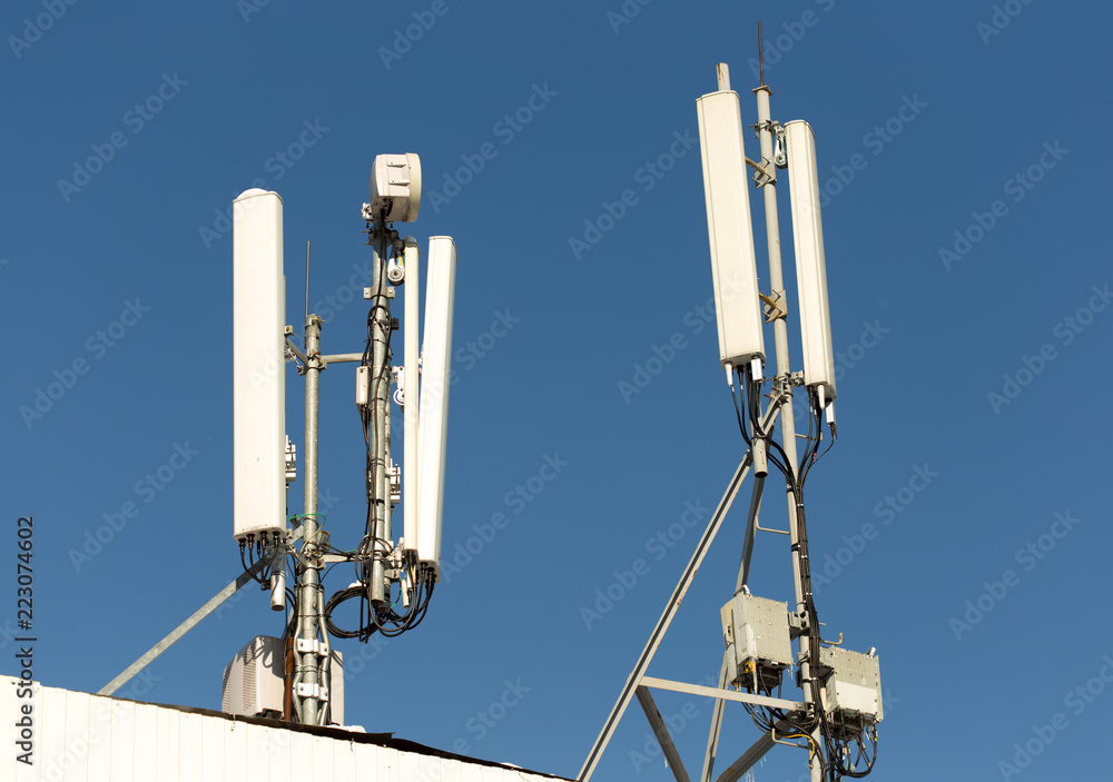 Cellular antenna on the roof of the building Cellular antenna on the roof of the building