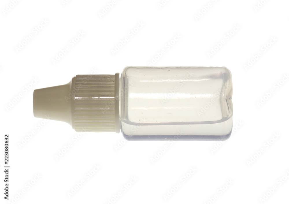 The oil in the oiler sewing machine on a white background The oil in the oiler sewing machine on a white background