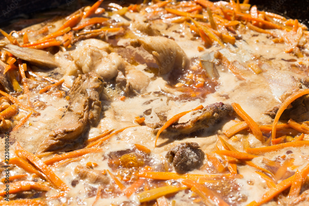 preparation of a national dish pilaf Uzbek people in the outbreak preparation of a national dish pilaf Uzbek people in the outbreak