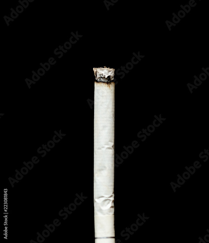 cigarette ash on a black background