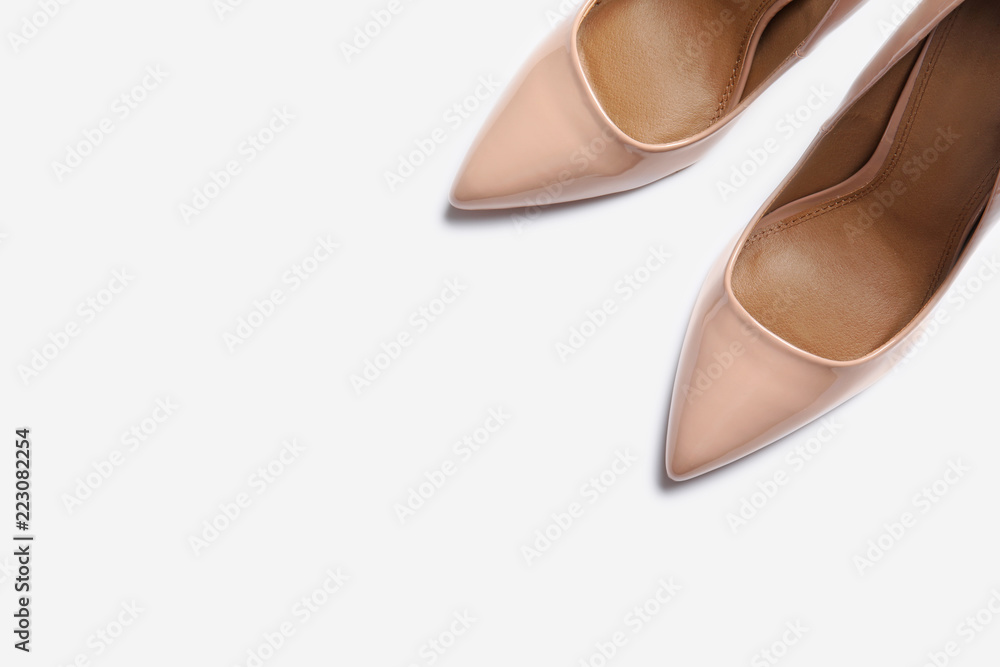 Pair of beautiful shoes on white background, top view Pair of beautiful shoes on white background, top view