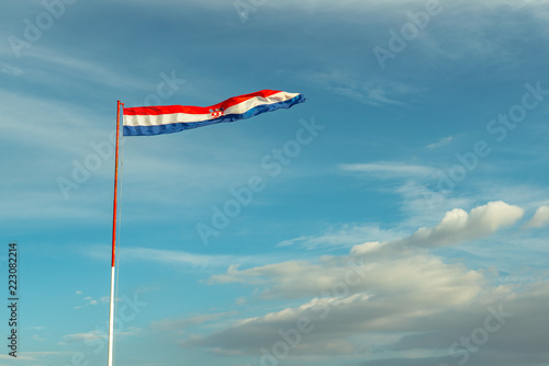 The croation flag on a windy day on daylight photo