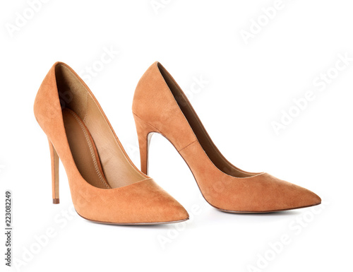 Pair of beautiful shoes on white background