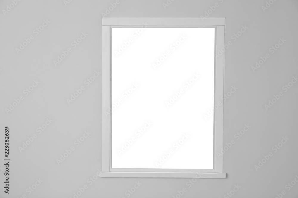 White wall with modern window indoors. Element of interior White wall with modern window indoors. Element of interior