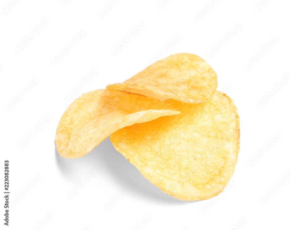 Tasty crispy potato chips on white background