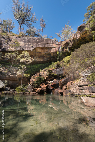 The virtually dry waterfall at the top of Rainbow Waters (Gudda Gumoo) gorge in Blackdown Tableland National Park, Queensland, Australia.